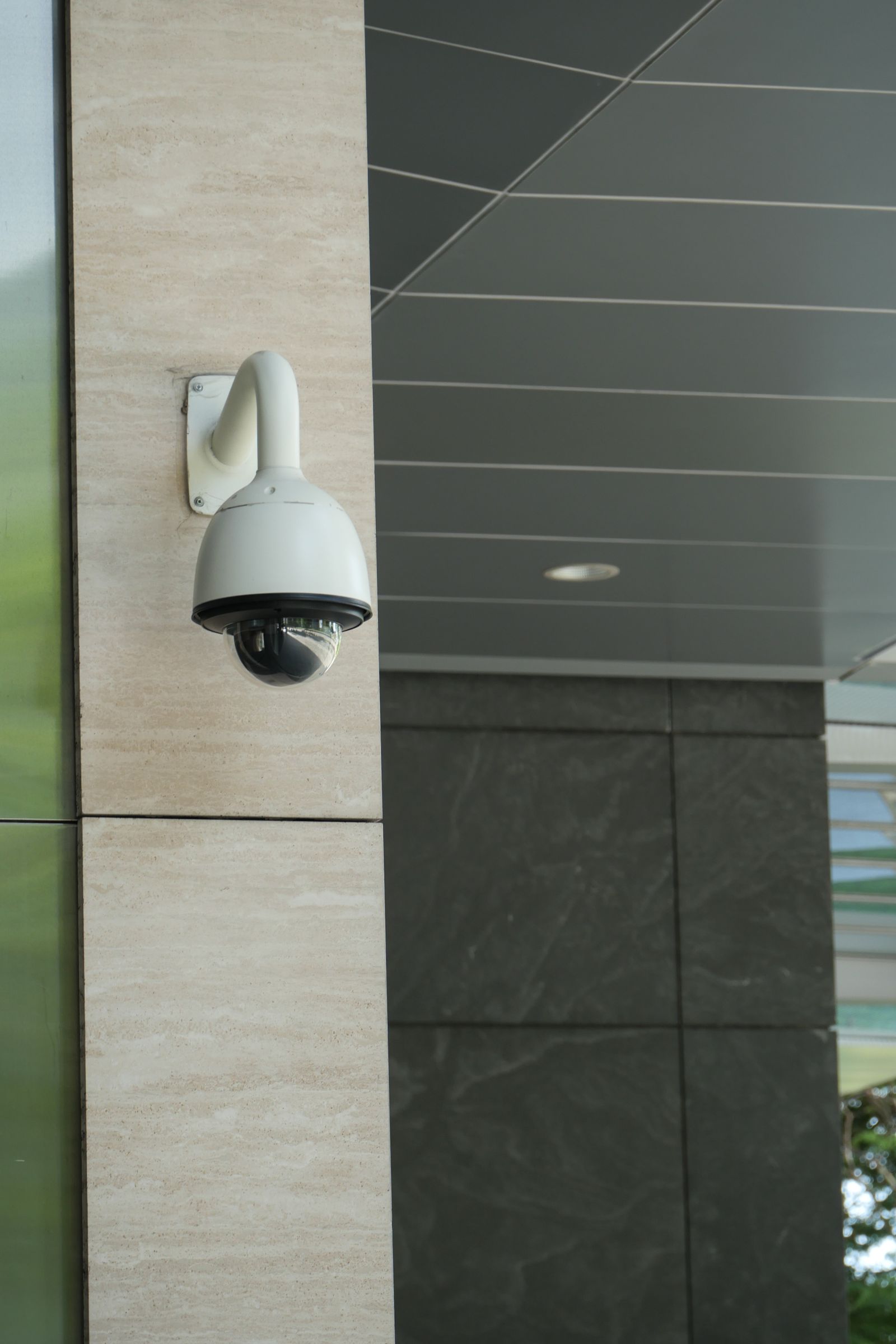 Technician installing a security camera