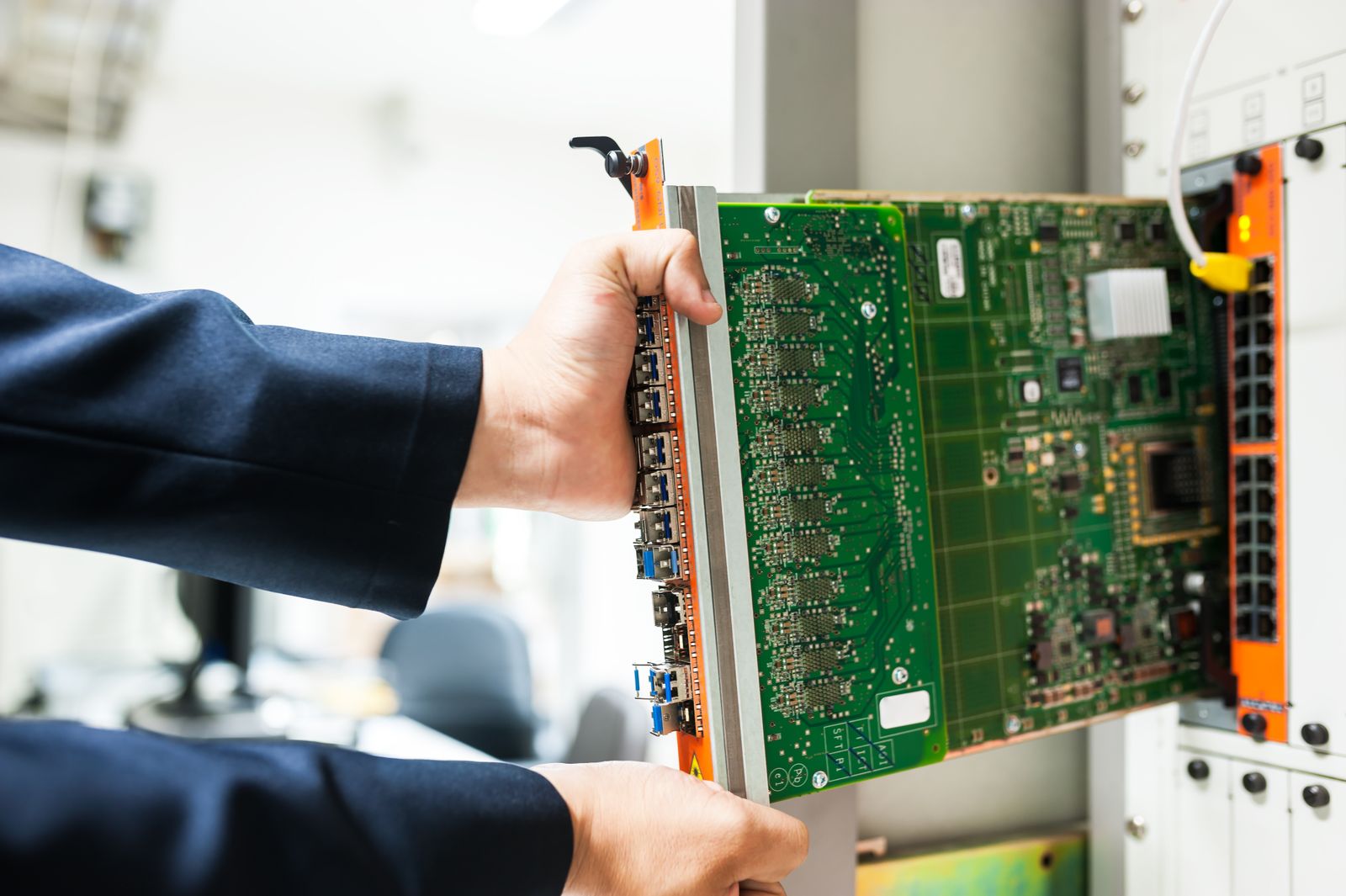 Technician working in a server room