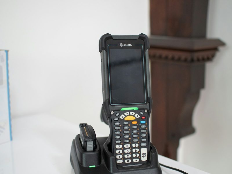 Handheld barcode scanner in a charging dock