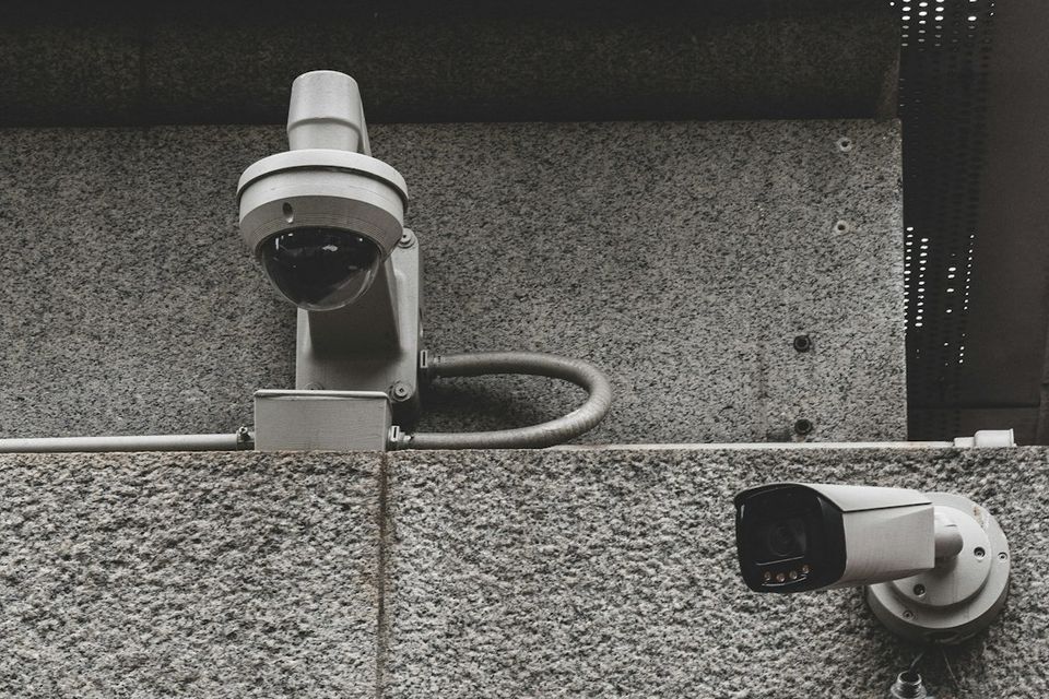 Security cameras mounted on a building wall